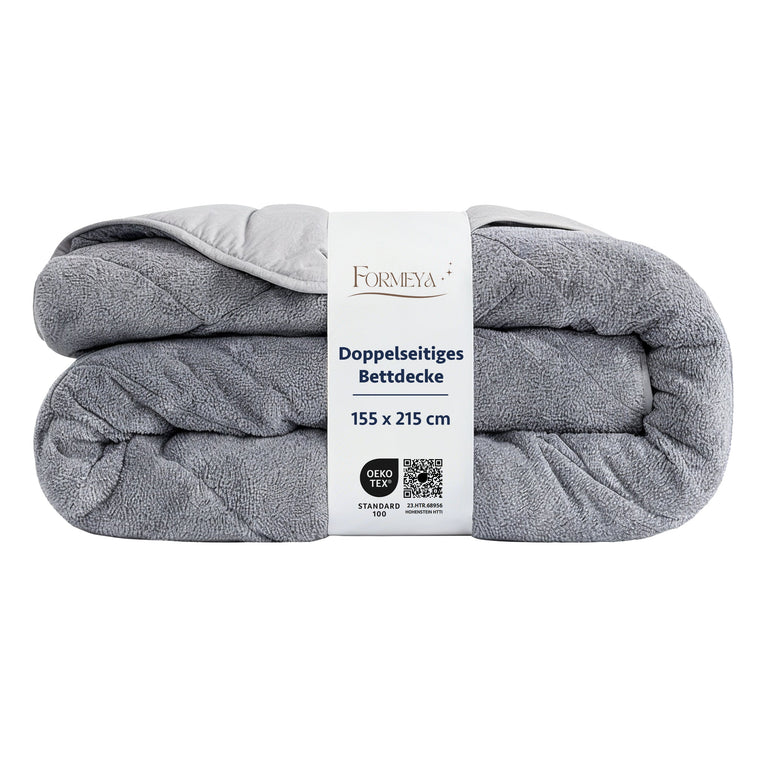 HELDENA Wellsoft Bettdecke Grau auf einem modernen Bett