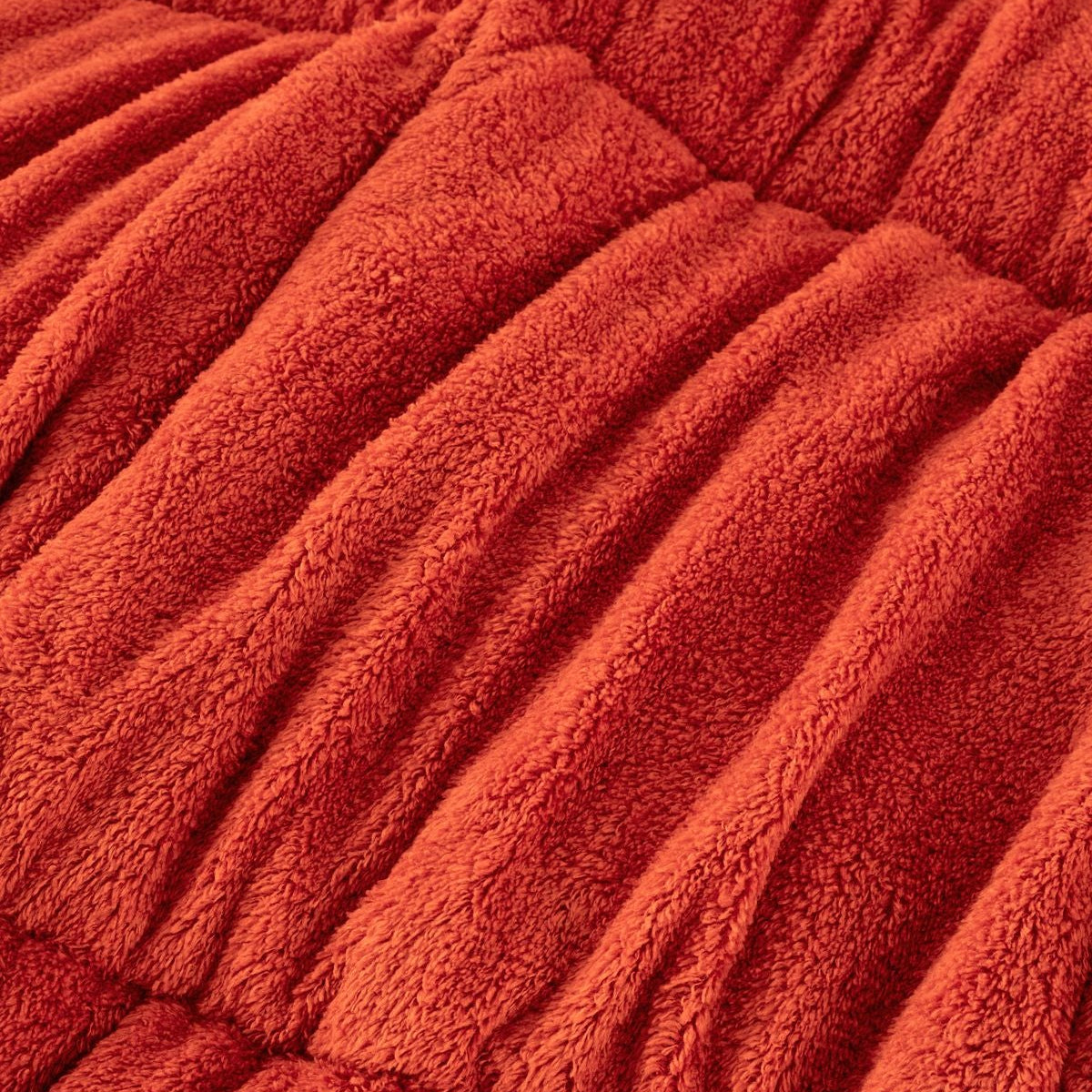 Bettdecke Orange als Tagesdecke fuer moderne Wohntextilien