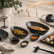 Wilmax Ovale Schale 13 × 10 × 6 cm 6er-Set Schwarz Porzellan – Anwendungs- oder Detailansicht; Lieferumfang: 6 Stück