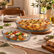 HELDENA ovale Glas-Auflaufformen 2er Set – gedeckter Tisch mit warmen Speisen