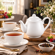 Wilmax Kaffee- und Teekanne mit Ausgusssieb 850 ml Weiß Porzellan – Anwendungs- oder Detailansicht; Lieferumfang: 1 Stück