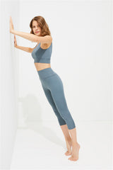 Cottonhill Capri-Leggings Graublau, Seitenansicht beim Dehnen – Top nicht im Lieferumfang